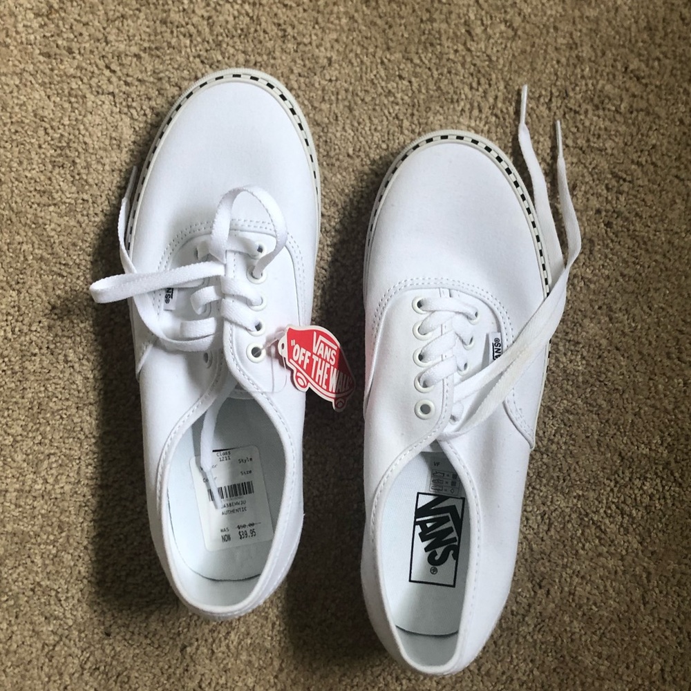 brand new white vans with black checkered edges